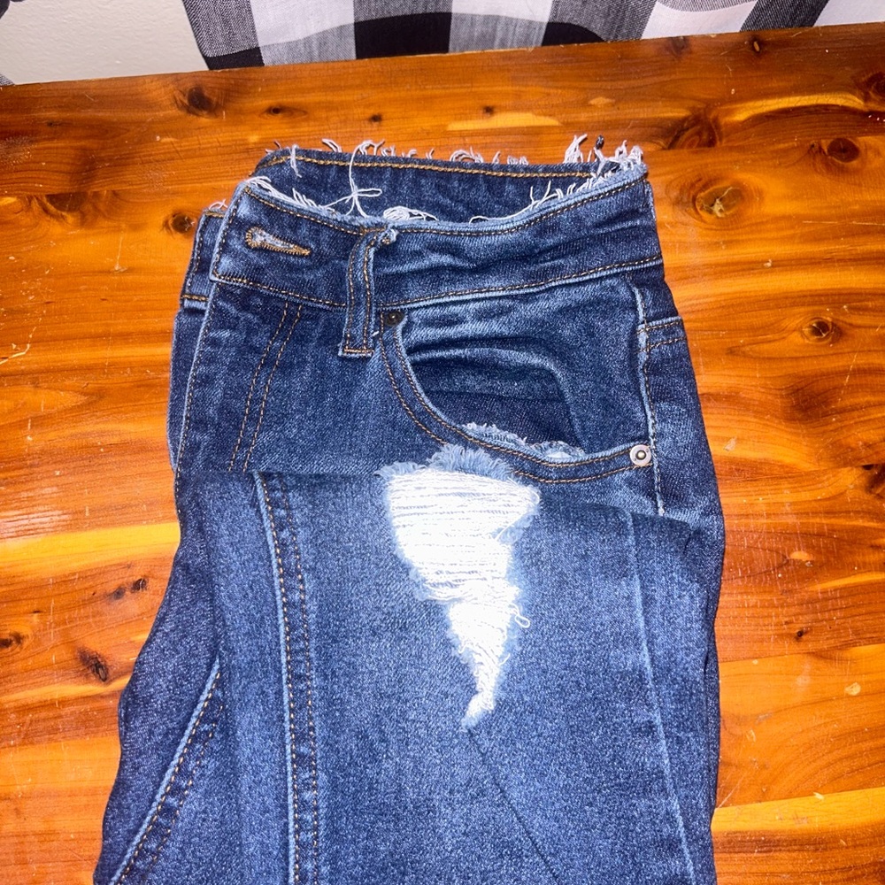 Distressed Blue Jeans